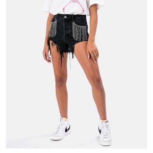 Black denim shorts with silver sparkly fringe